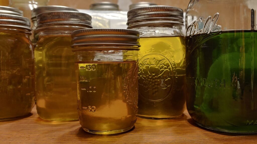 Jars full of infused oils.