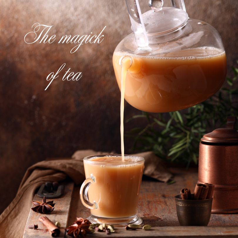 Chai tea being poured into a tea cup